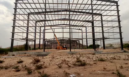 PEB primary frame erected on open ground