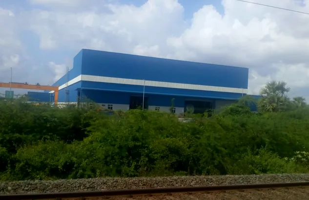 Complete blue PEB plant building with gantry crane