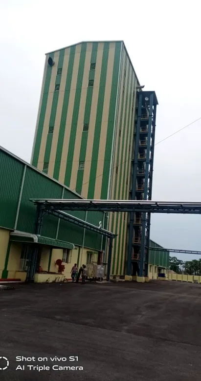 Processing tower and conveyor gallery