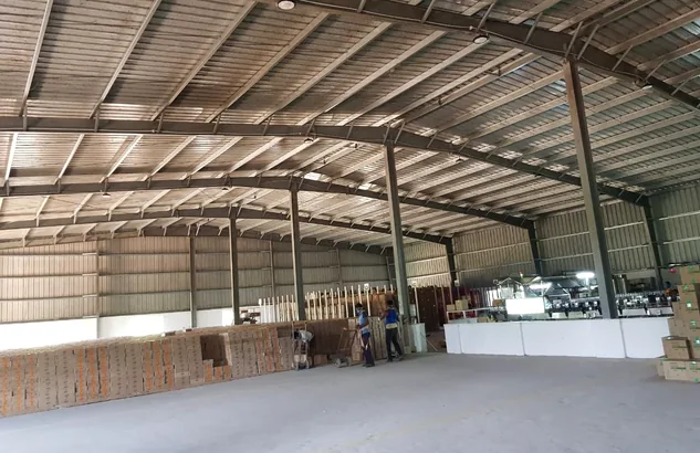 Operational warehouse interior at handover